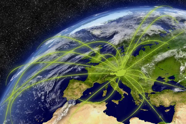 Austria shows up green on a globe and is linked to other countries by green lines