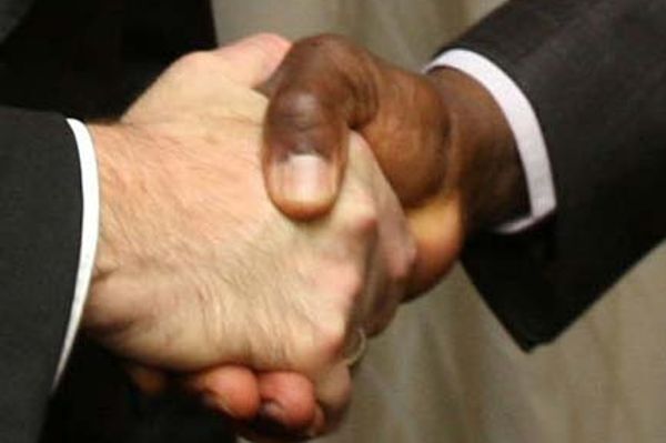 In the picture two hands shaking