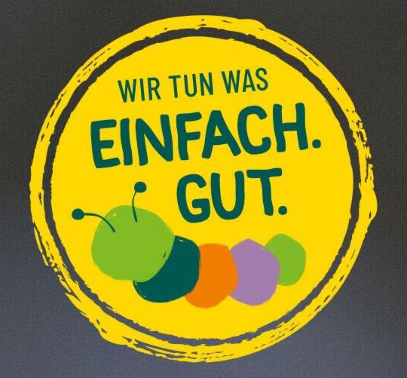 Logo des Projekts "Einfach Gut". Gelber Stempel mit dem Schriftzug "WIR TUN WAS" und darunter "Einfach. Gut." Ebenso im gelben Kreis ist eine abstrakte Raupe in vier bunten Farben.