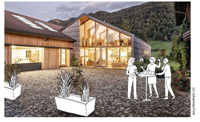 Ein Foto von einem Innovationhub mit sprechenden Personen illustriert. 